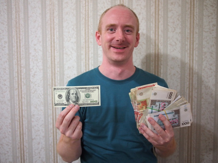 $100 US Dollars exchanged on the black market to 300,000 Uzbek Som!