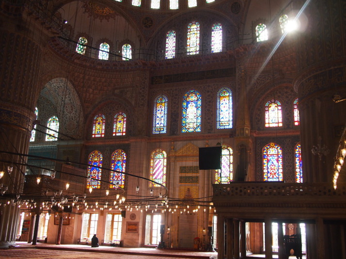 Inside the Sultan Ahmet Camii or Blue Mosque. The colours, light and shapes are almost too much for the senses!