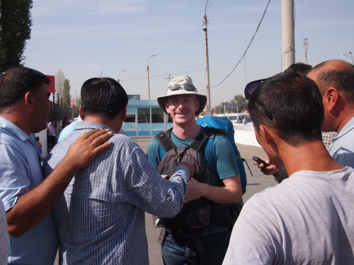 Surrounded by taxi drivers at Kuyluk Bazaar