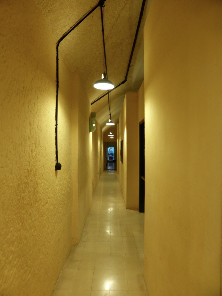 The upper corridor of the Lascaris War Rooms, they carved out two floors of rooms and decorated it with scrap material from bombed houses. All of the metal  was recovered from ships sunk in the harbour