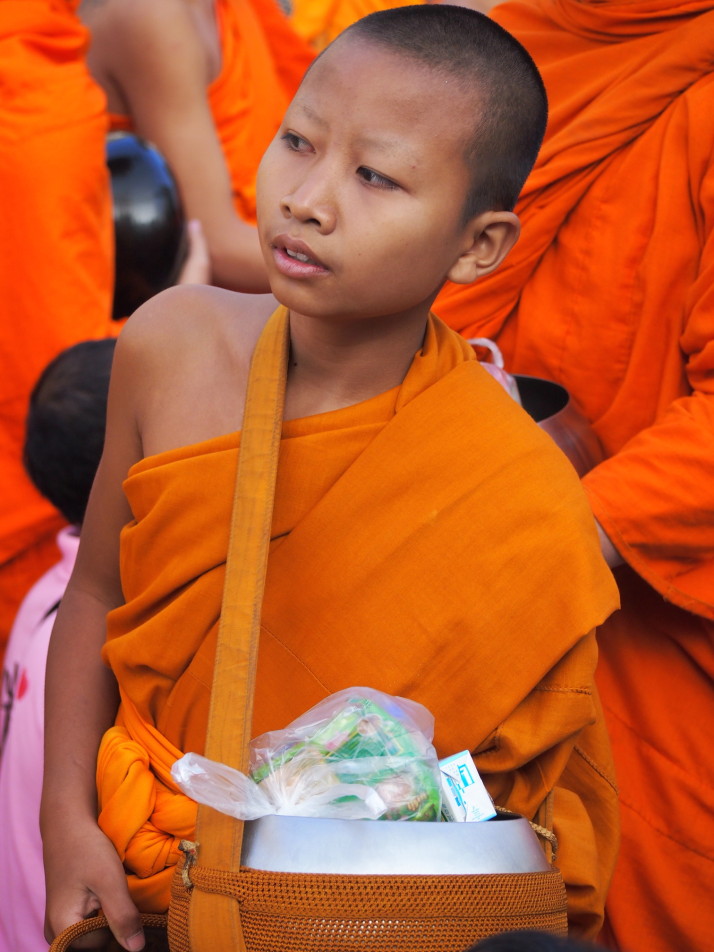 Monk collecting alms